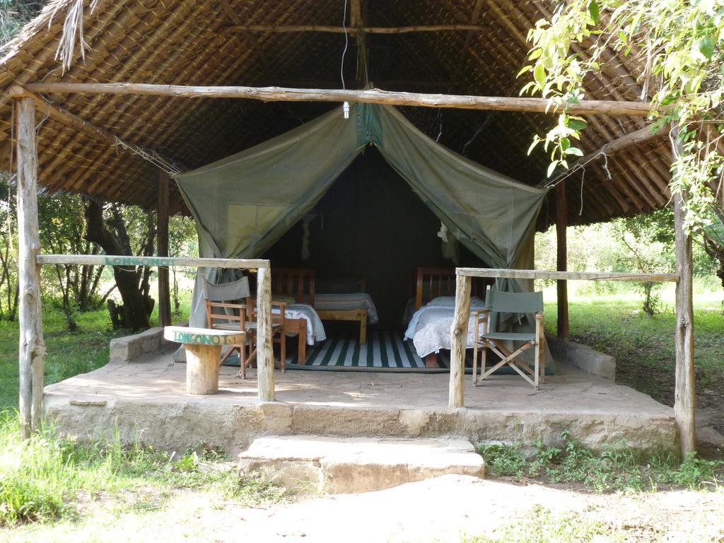 Отель Enchoro Wildlife Camp Ololaimutiek Экстерьер фото