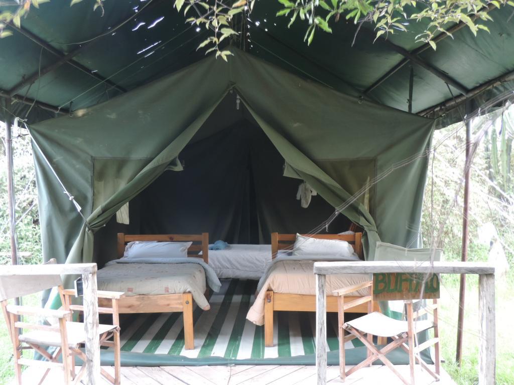 Отель Enchoro Wildlife Camp Ololaimutiek Экстерьер фото