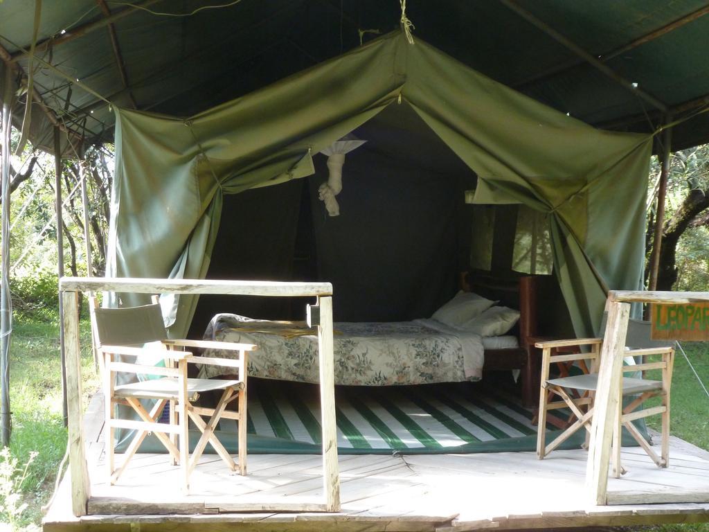 Отель Enchoro Wildlife Camp Ololaimutiek Экстерьер фото