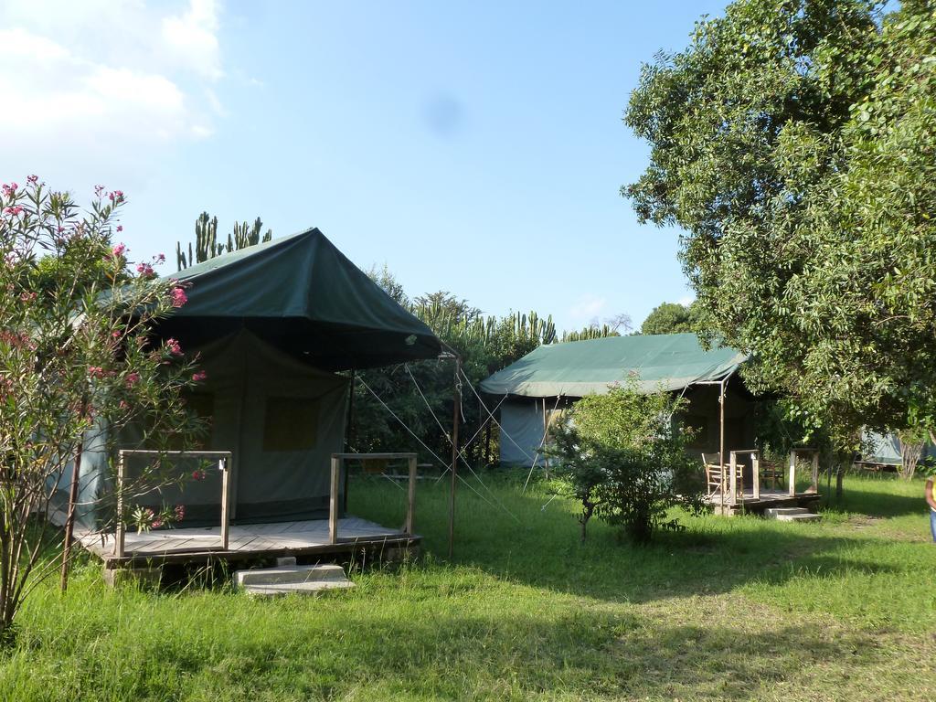 Отель Enchoro Wildlife Camp Ololaimutiek Экстерьер фото