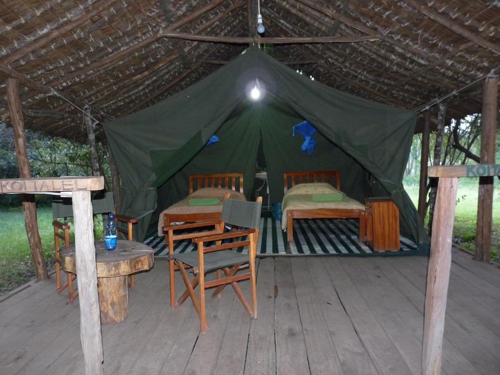 Отель Enchoro Wildlife Camp Ololaimutiek Экстерьер фото