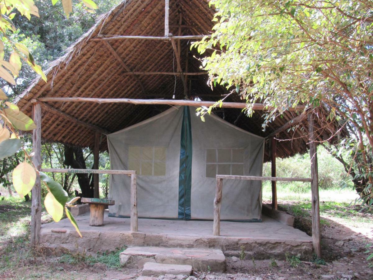 Отель Enchoro Wildlife Camp Ololaimutiek Экстерьер фото